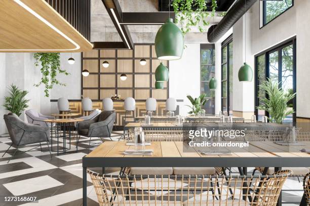 interior of luxury cafe with bar counter, plants and tables - modern cafe stock pictures, royalty-free photos & images