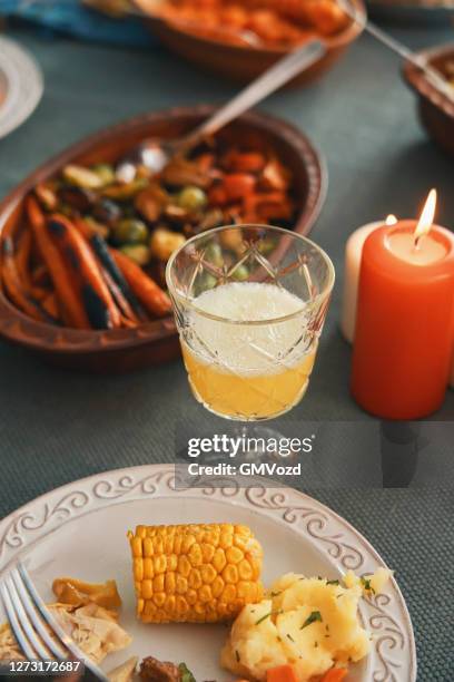 family having traditional holiday stuffed turkey dinner - christmas mince pies stock pictures, royalty-free photos & images