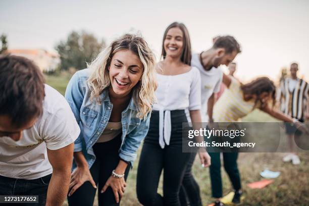 group of young people on team building in nature - team building stock pictures, royalty-free photos & images