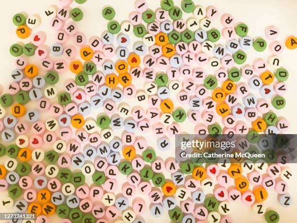 various alphabet letter beads - beads stock pictures, royalty-free photos & images