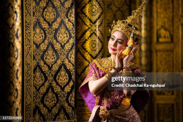 thailand culture khon performance arts acting entertainment dance traditional costume. asia acting dancing pantomime show.actress sida in traditional pantomime is dancing. - thai actresses stock-fotos und bilder