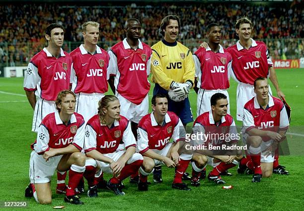 The Arsenal team have a team picture before the UEFA Champions League against Lens at the Felix Bollarent Stadium in Lens, France. The game ended in...