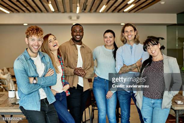 organized group photo of cheerful and diverse business team - organised group photo stock pictures, royalty-free photos & images