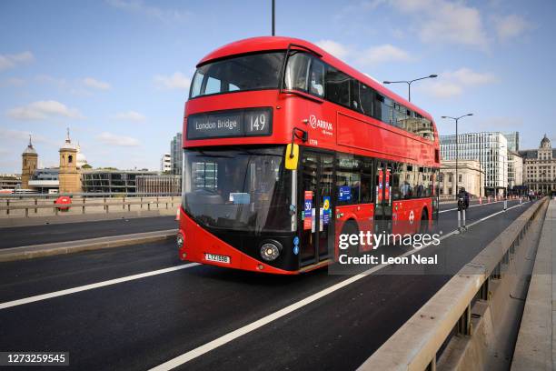 Bus travels across limited access lane on London Bridge on September 17, 2020 in London, England. A number of London's bridges have recently either...