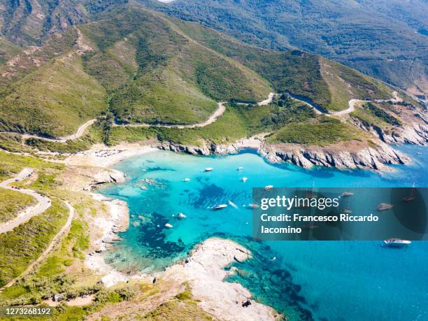 scenic seascape and road near anse d'aliso, corsica, france - corsica 個照片及圖片檔