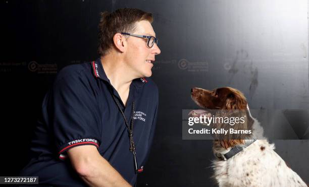 Dog Handler, Senior Firefighter Alex Withers of the Metropolitan fire service SA and the Sa Urban Search and Rescue Task Force with his English...