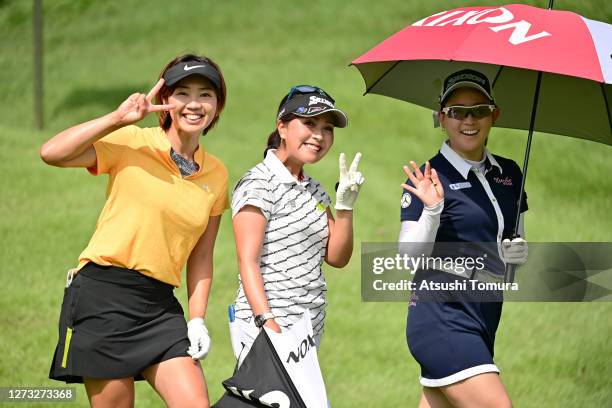 Rumi Yoshiba, Serena Aoki and Kotono Kozuma of Japan smile during the first round of the Descente Ladies Tokai Classic at the Shin Minami Aichi...