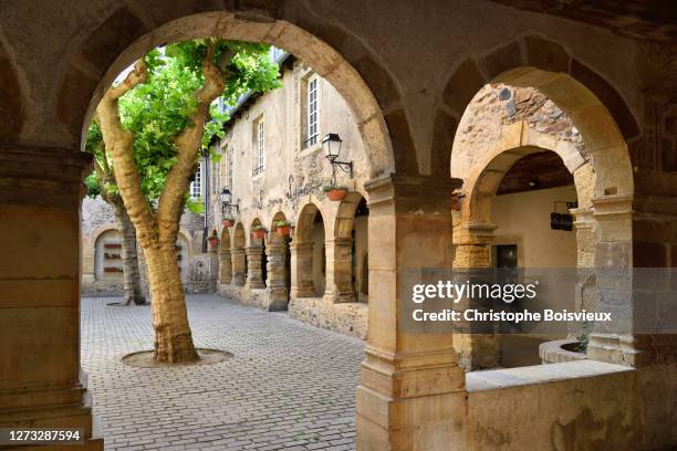 france, aveyron, saint-geniez-d'olt, monastere des augustins, the cloister - aveyron stock pictures, royalty-free photos & images