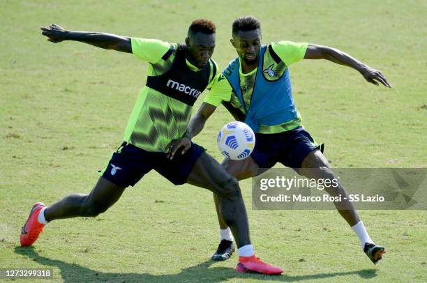 Felipe Caicedo and Juan Daniel Akpa Akpro of SS Lazio during the SS Lazio training session at the Formello sport center on September 18, 2020 in...