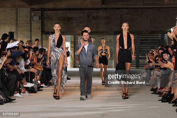 Anthony Vaccarello walks the runway during the Anthony Vaccarello Ready to Wear Spring / Summer 2012 show during Paris Fashion Week at Cite de la...