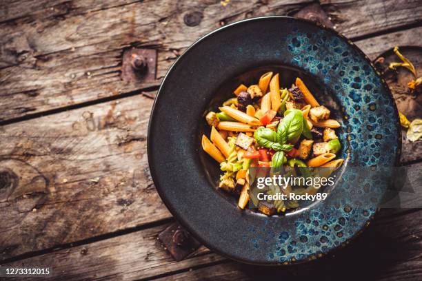 vegan low carb lentil pasta with veggies and tofu - pasta salad stock pictures, royalty-free photos & images