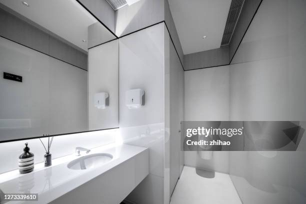 men's room - bathroom ceiling stock pictures, royalty-free photos & images