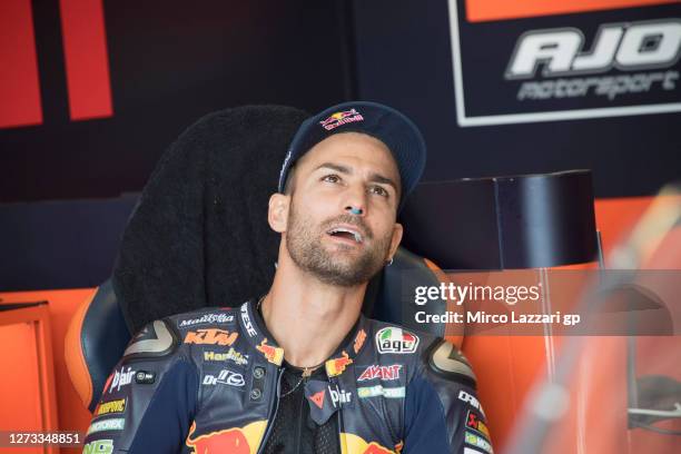 Mattia Pasini of Italy and Red Bull KTM Ajo looks on in box during the MotoGP Of San Marino - Free Practice at Misano World Circuit on September 18,...