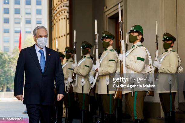 President of Chile Sebastián Piñera enters the Palacio de La Moneda for the official family photo during the Independence Day celebrations on...