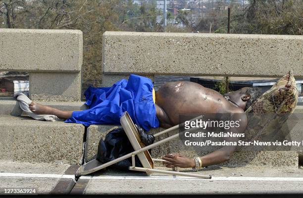 Body of a man who was killed during the hurricane was left on Interstate 10 just north of the SuperDome during the aftermath of Hurricane Katrina...