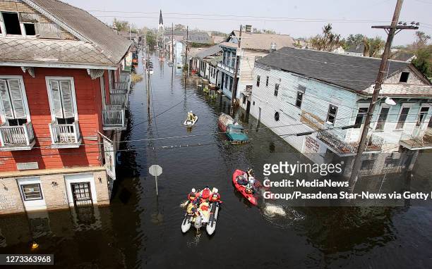 Los Angeles County and Los Angeles City Swift Water Urban Search and Rescue Teams head up Orleans St. In search of victims during the aftermath of...