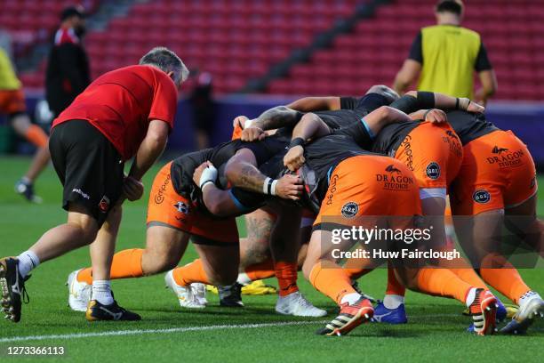 The Dragons practice their scrummaging prior to the European Rugby Challenge Cup Quarter Final match between Bristol Bears and Dragons at Ashton Gate...