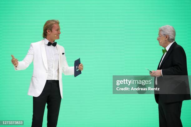 Nico Rosberg and Frank Elstner speak on stage at the Green Award as part of the Greentech Festival at Kraftwerk Mitte on September 18, 2020 in...