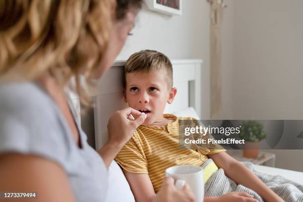 i'm not feeling so well, mom - bronchitis stock pictures, royalty-free photos & images