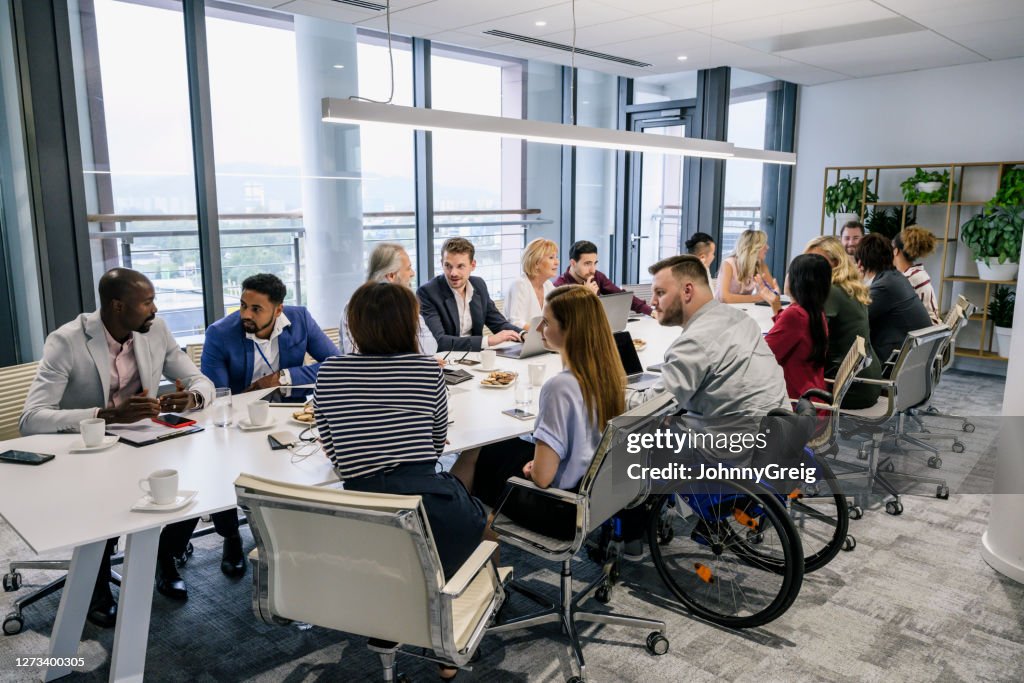 Informal discussions between colleagues in board room