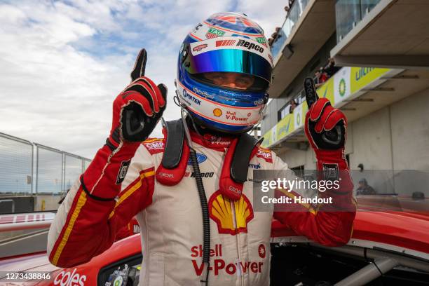 In this handout photo provided by Edge Photographics, Fabian Coulthard driver of the Shell V-Power Racing Team Ford Mustang celebrates after winning...