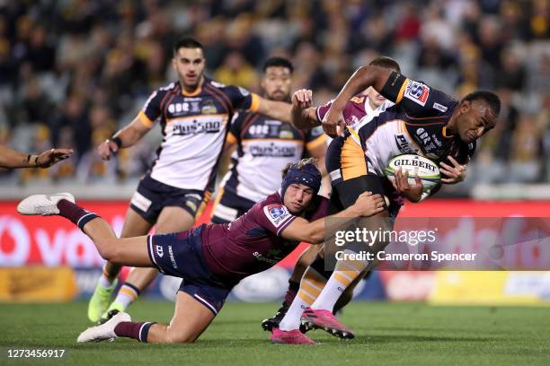 Tevita Kuridrani of the Brumbies is tackled during the Super Rugby AU Grand Final between the Brumbies and the Reds at GIO Stadium on September 19,...