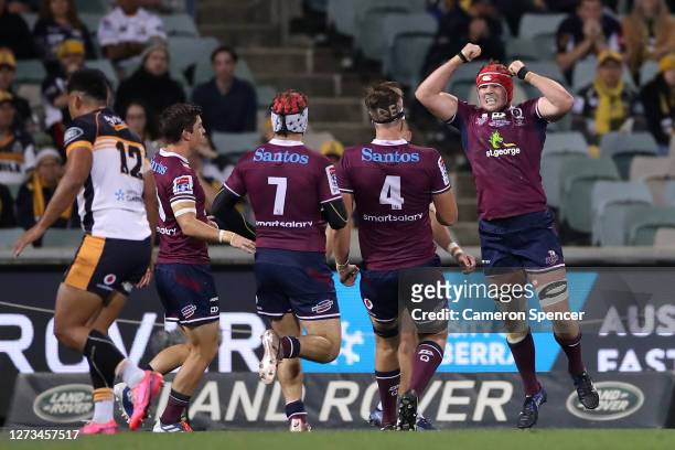Harry Wilson of the Reds celebrates a try during the Super Rugby AU Grand Final between the Brumbies and the Reds at GIO Stadium on September 19,...
