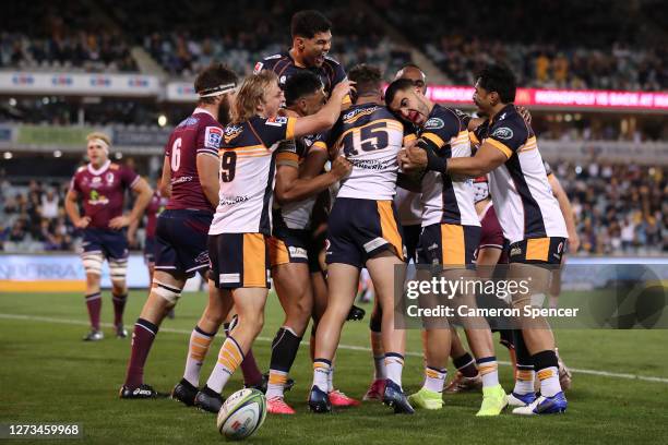 Thomas Banks of the Brumbies celebrates with team mates after scoring a try during the Super Rugby AU Grand Final between the Brumbies and the Reds...