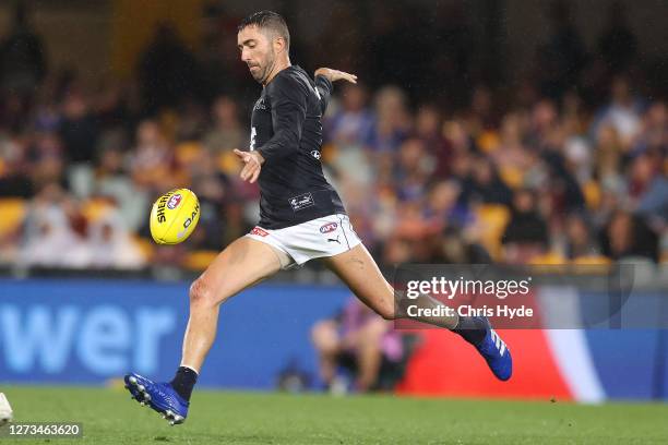 Kade Simpson of the Blues kicks during the round 18 AFL match between the Brisbane Lions and the Carlton Blues at The Gabba on September 19, 2020 in...