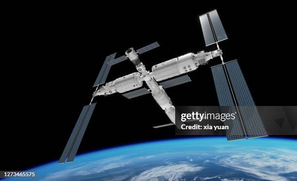 chinese space station in earth orbit - raumstation stock-fotos und bilder