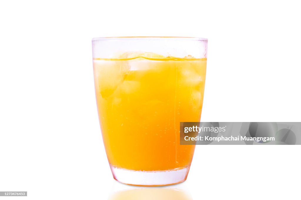 Freshly squeezed orange juice with ice. Juice in a glass isolate on white background with clipping path