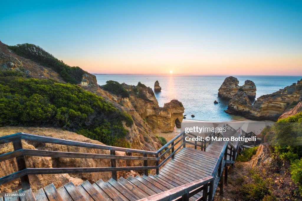 Walkway to idyllic beach, Algarve, Portugal