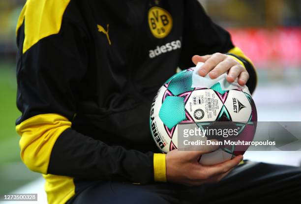 Ball is disinfected during the Bundesliga match between Borussia Dortmund and Borussia Moenchengladbach at Signal Iduna Park on September 19, 2020 in...