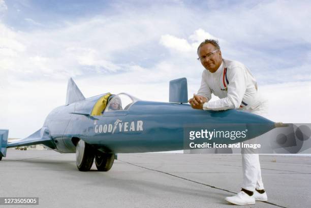 Walt Arfons, a pioneer in the use of aircraft jet engines for land speed competitions, stands with the Goodyear Wingfoot Express 2 at the Bonneville...