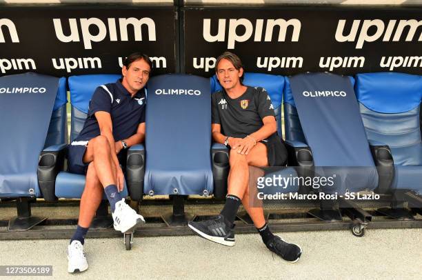 Lazio head coach Simone Inzaghi and Benevento head coach Filippo Inzaghi talk before the Friendly Match between SS Lazio and Benevento at Olimpico...