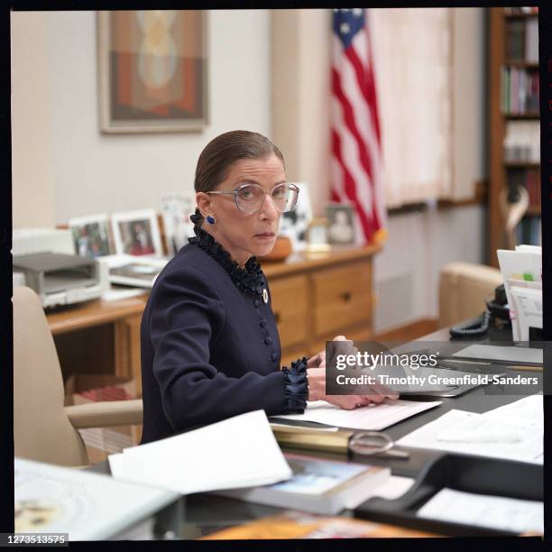 Associate Justice of the Supreme Courtof the United States, Ruth Bader Ginsburg is photographed in 1997 in her office in Washington, DC.