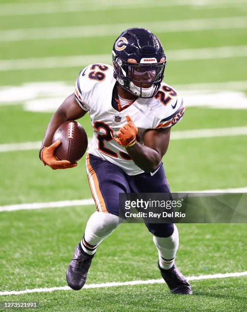 Tarik Cohen of the Chicago Bears runs for a first down during the third quarter of the game against the Detroit Lions at Ford Field on September 13,...