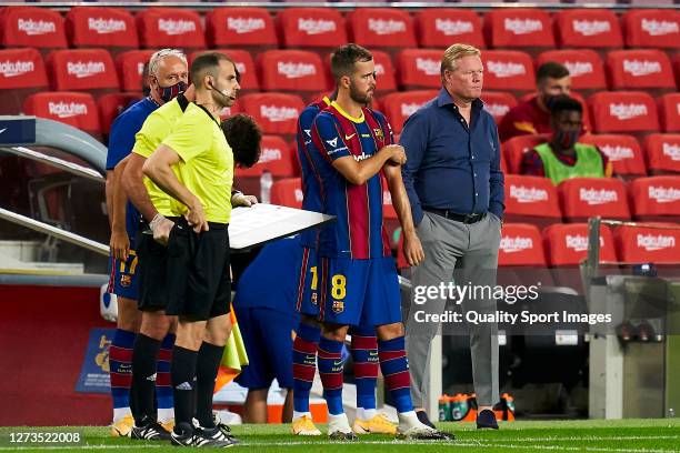 Miralem Pjanic and Ronald Koeman, head coach of FC Barcelona during the Joan Gamper Trophy match between FC Barcelona and Elche CF at Camp Nou on...