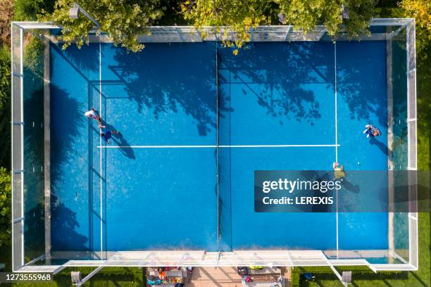 outdoor paddle tennis - blue tennis racket stock pictures, royalty-free photos & images