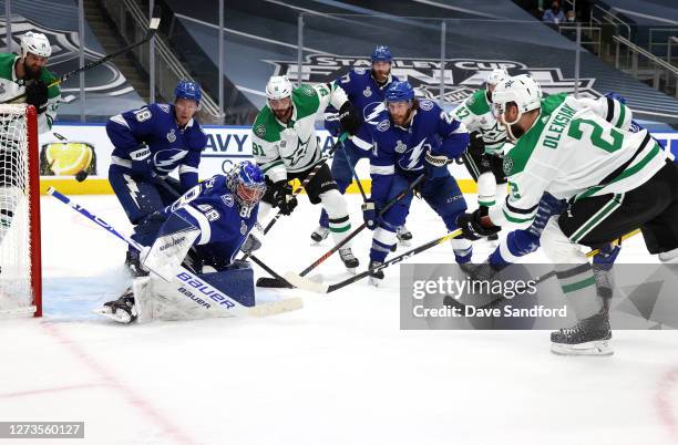 Goaltender Andrei Vasilevskiy of the Tampa Bay Lightning can't make the save on a shot for a goal by Jamie Oleksiak of the Dallas Stars in the second...