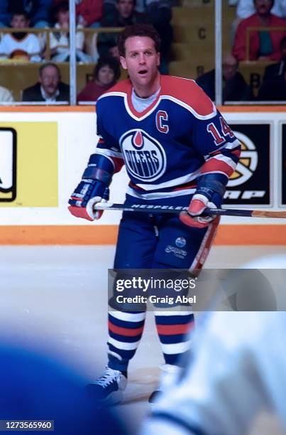 Craig MacTavish of the Edmonton Oilers skates against the Toronto Maple Leafs during NHL game action on February 19, 1994 at Maple Leaf Gardens in...