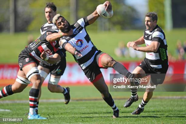 Lolagi Visinia of Hawke's Bay is tackled high by Samuel Sladeduring of Counties Manukau the round 2 Mitre 10 Cup match between Hawkes Bay and...