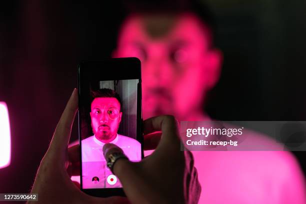 Man Using Cell Phone Light Face Phone Screen Light Face Photos and Premium High Res Pictures - Getty Images