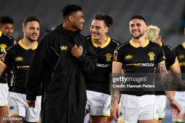 Julian Savea, Peter Umaga-Jensen and TJ Perenara of Wellington celebrate after winning the round 2 Mitre 10 Cup match between Auckland and Wellington...