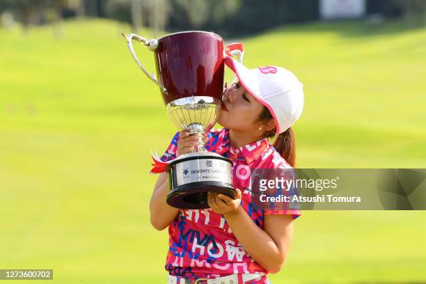 Ayaka Furue of Japan kisses the trophy after winning the tournament following the final round of the Descente Ladies Tokai Classic at the Shin Minami...