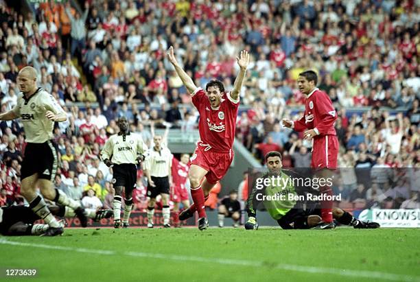 Robbie Fowler of Liverpool celebrates after scoring on his return from injury during the FA Carling Premiership match against Charlton Athletic at...