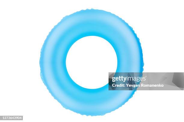 blue inflatable ring isolated on white background - salvagente foto e immagini stock