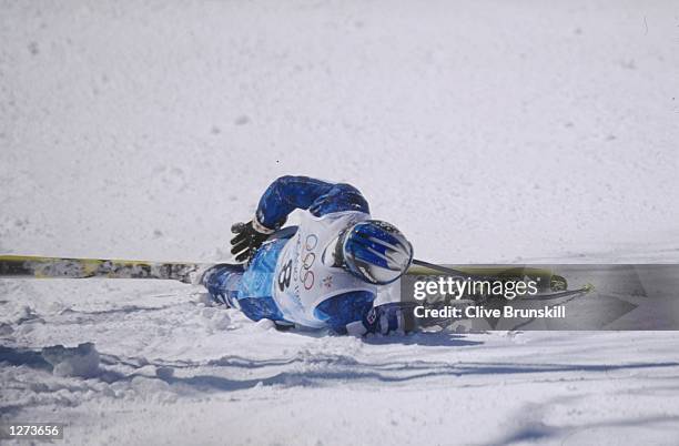 Alberto Tomba of Italy falls during the mens giant slalom at Shiga Kogen during the 1998 Olympic Winter Games in Nagano, Japan. \ Mandatory Credit:...