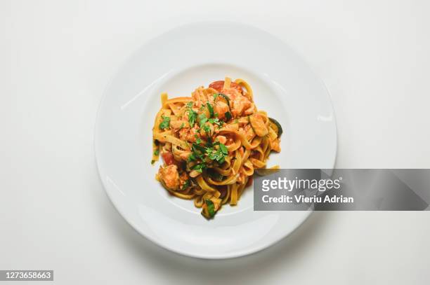 tagliatelle with salmon,pasta eat italy - vegetable fried rice stock-fotos und bilder