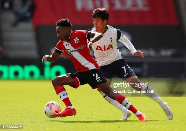 Kyle Walker-Peters of Southampton is challenged by Heung-Min Son of Tottenham Hotspur during the Premier League match between Southampton and...